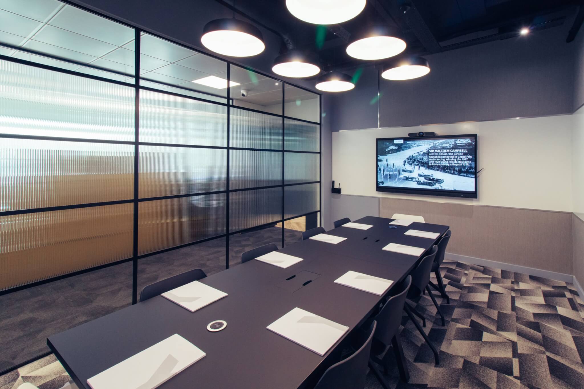The Campbell meeting room with a screen displaying Sir Malcolm Campbell's Grand Prix history
