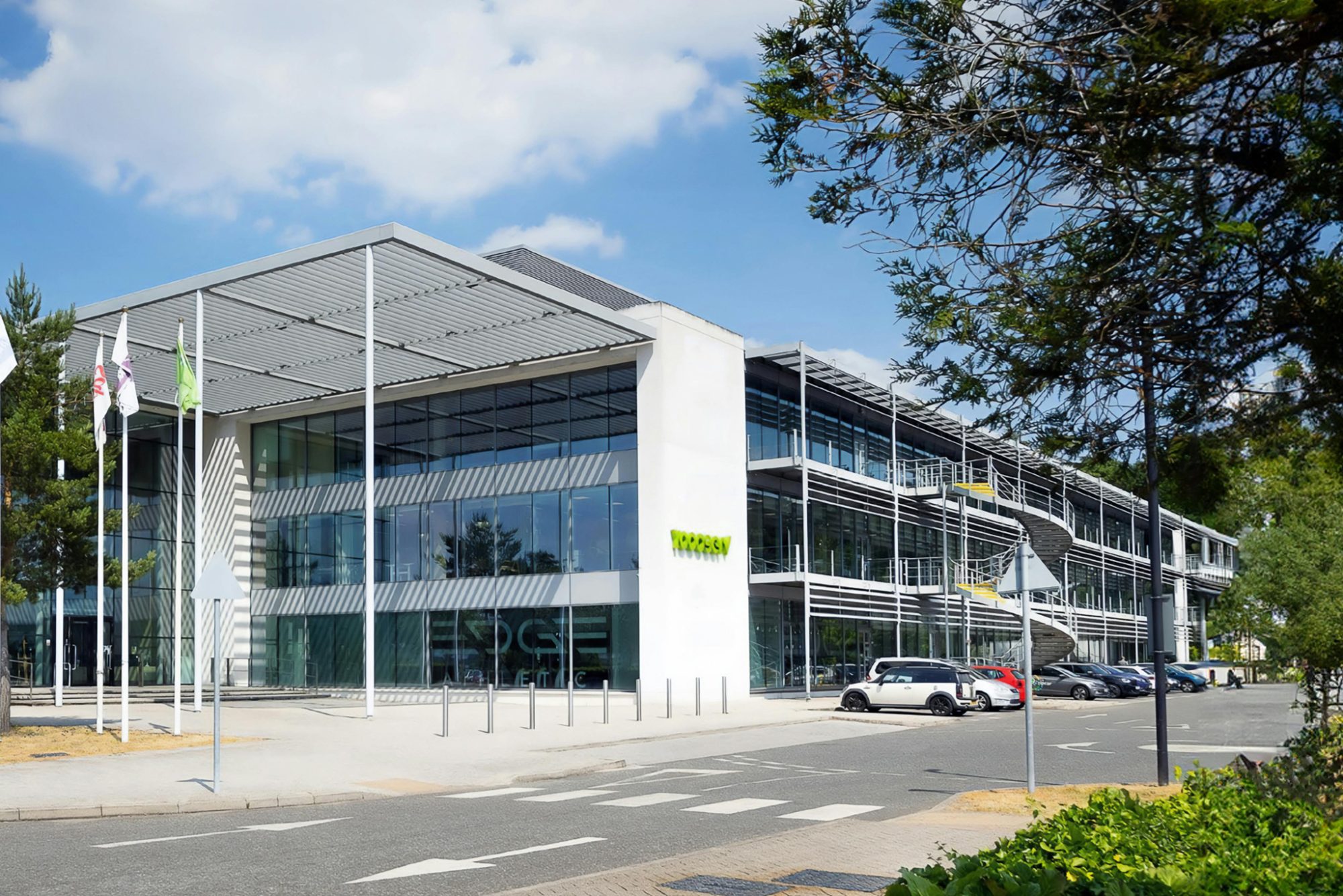 Exterior of the No5 Weybridge office building with 'Yoooserv' and 'Edge' signage